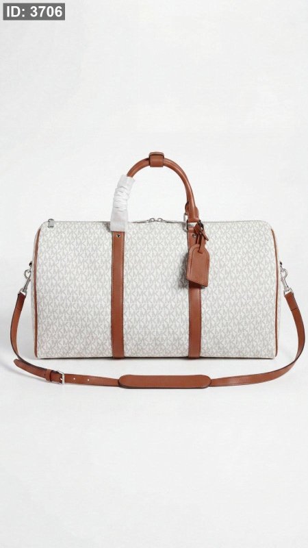 شنطة سفرية -  Micheal Kors / مقاس 50 CM شامل ايد